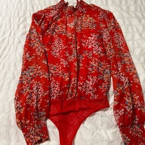 Blouse bodysuit. Beautiful for work out a day out.